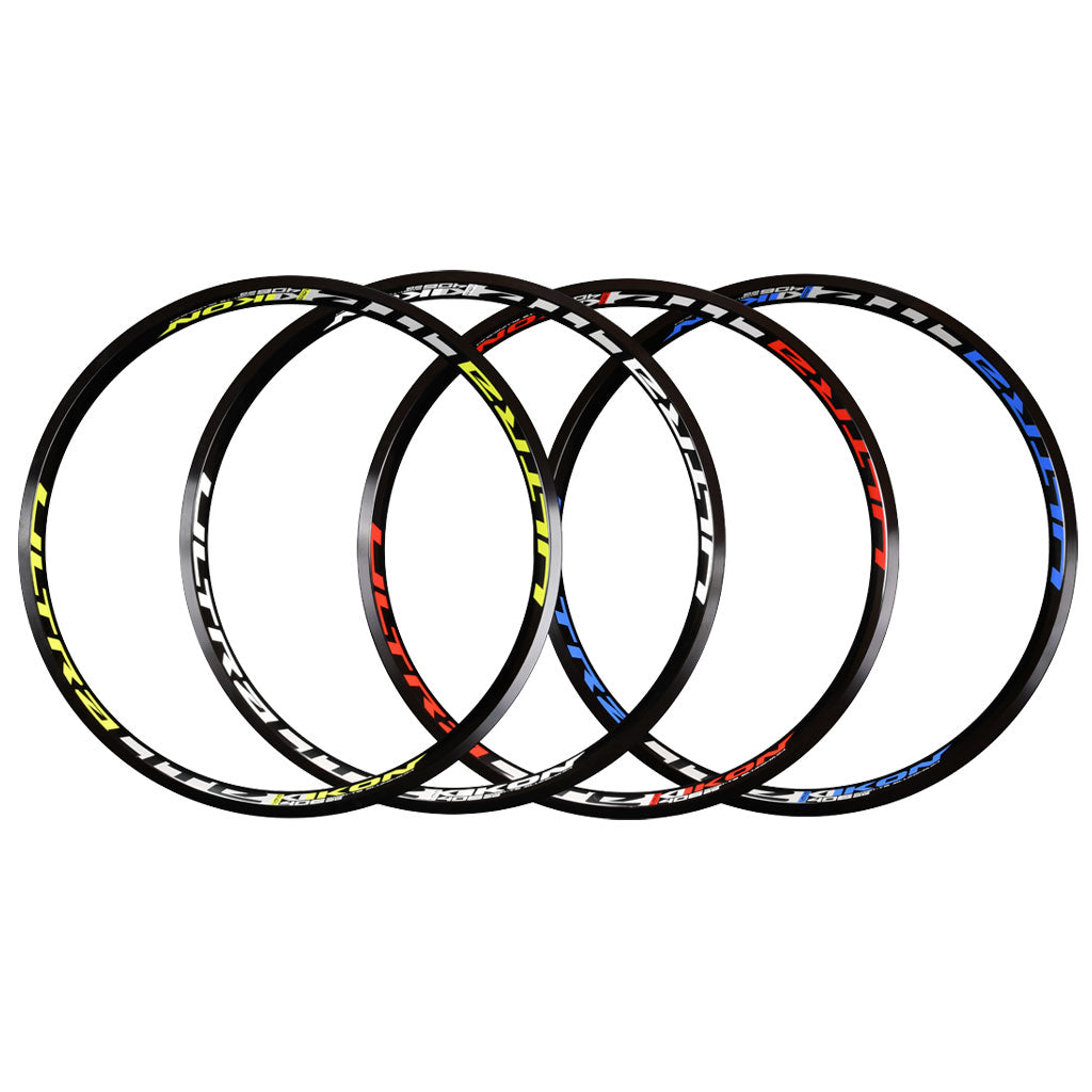 A set of four IKON ALLOY RIM (20 x 1.75 BRAKE) bicycle rims with different colors.