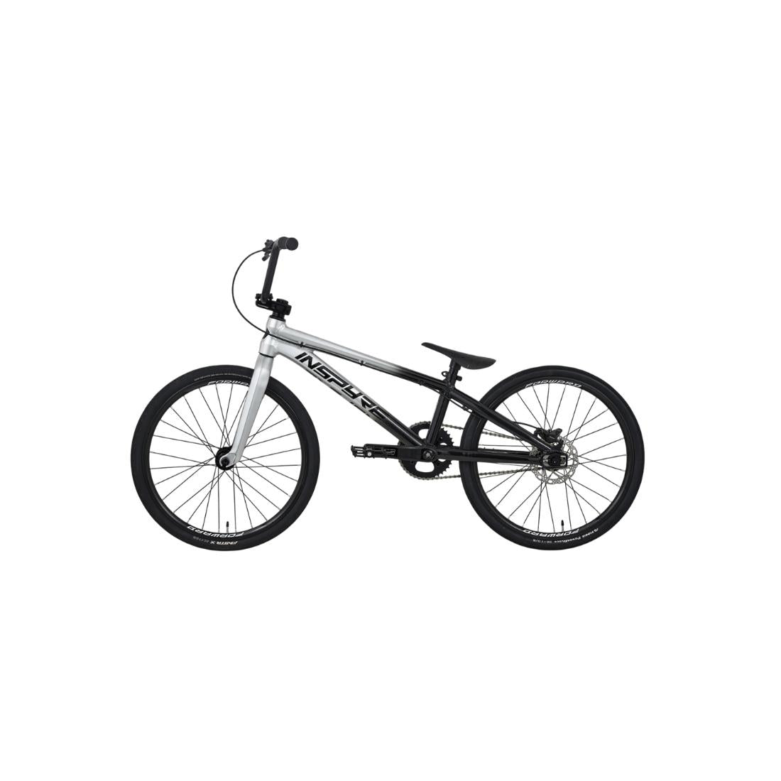 Side view of an Inspyre EVO-C Expert Race Bike (2027) featuring a black and silver frame, black seat, SD B-85 cranks, carbon Pride fork, and black wheels, displayed against a plain white background.