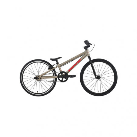 The Inspyre Neo Micro Race Bike (2027) is a BMX-style bicycle featuring a tan frame, black saddle, black handlebars, and black wheels, shown from the side against a white background. Designed as an entry-level race bike with 18-inch micro-sized wheels, it’s ideal for aspiring young riders beginning their racing journey.