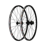 The Box Three Expert Disc Wheel Set 28 Hole—black, spoked bicycle wheels with Box Three hubs—is displayed upright side by side on a white background.