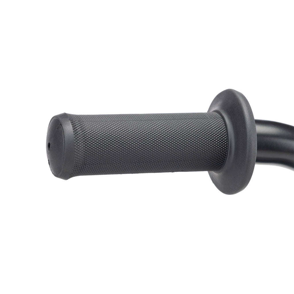 Close-up of the Kink Coast 12 Inch Balance Bike's black rubber handlebar grip with a textured surface, ideal for kids BMX rides, attached to a metal handlebar.