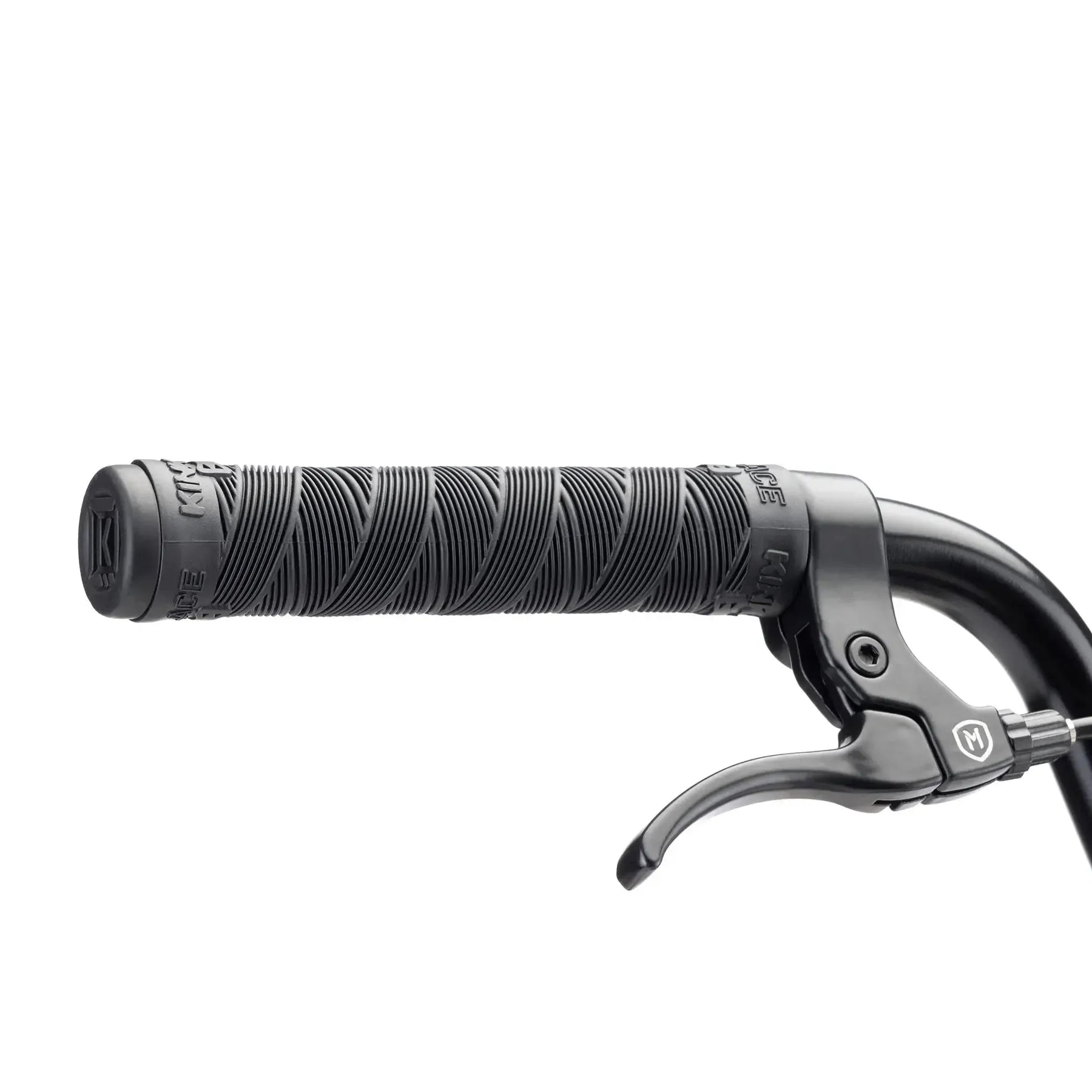 Close-up of a handlebar on the Kink Gap 20 Inch Bike, showcasing a textured grip design and a brake lever, seamlessly paired with Mission X7 Rims for an improved riding experience.