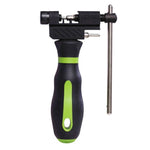 The KMC Professional Chain Breaker, in black and green, is equipped with a reversible de-riveting pin and is expertly designed with a sturdy handle and metal lever for efficient chain maintenance.