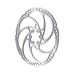 The Magura Storm HC 140mm Rotor features a spiral pattern and vent holes, designed to enhance braking performance and heat dissipation. This metallic bicycle disc brake rotor ensures efficient stopping power when used with Magura brakes.