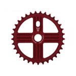 Red metallic MCS Neptune Helm Chainwheel featuring a cross pattern and branding text that reads “Profile Racing, Made in USA” and “Imperial" around the center hole.