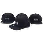 Four black Meybo Wing Snap Back Caps with flat brims and front logo patches are displayed against a white background.