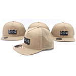 Four beige Meybo Wing Snap Back Caps, each featuring a "Meybo Bicycle Works" logo patch on the front mesh panel, are shown from different angles to showcase the Dutch brand’s iconic style.