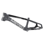 The Meybo 2026 HSX Alloy Junior Frame in gray and black is shown from the side, built with 6061 T-6 hydroformed tubing and displaying bold branding and geometric design accents.