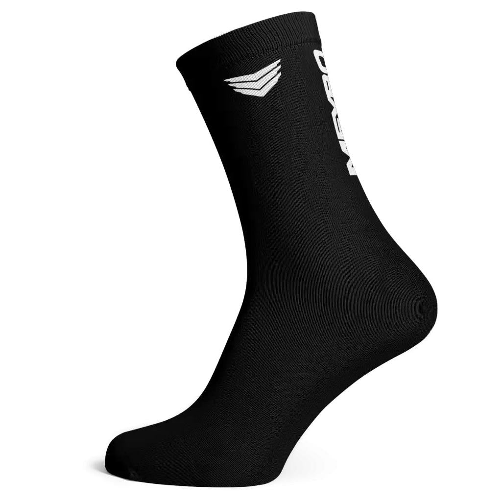 The Meybo Ribbed Crew Sock in black features a white logo and chevron by the upper cuff, shown on an angled mannequin foot against a white background—ideal for racing or showing your style.