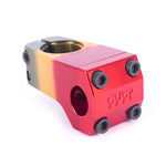 The Cult Mind Control Stem is crafted from 6061 aluminum with a gold-to-red gradient finish, four black bolts, and engraved text on the front face in a front-loading design.