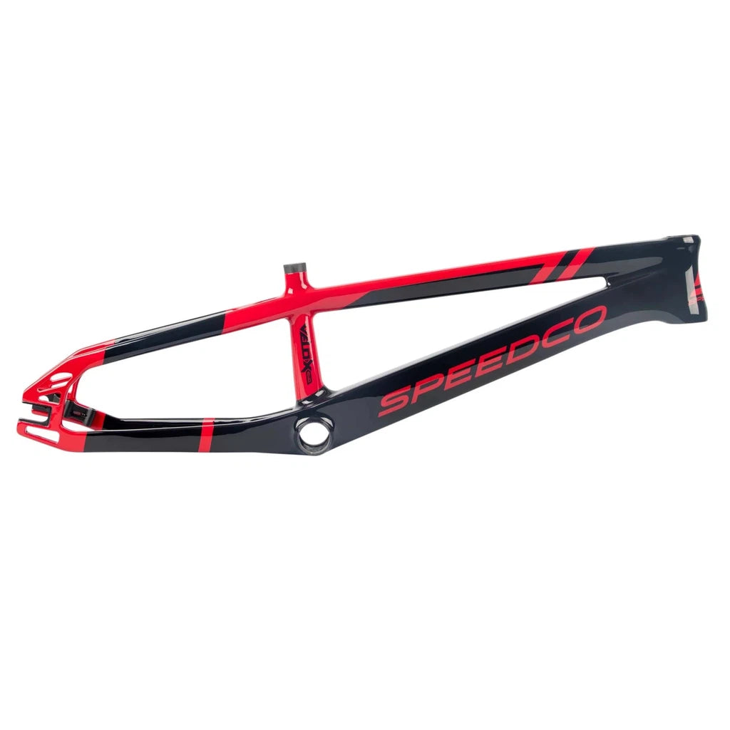 The 2024 Speedco Velox EVO Carbon Frame PRO XXXL features a black and red bike frame on a white background. These innovative bikes offer a racing advantage with aerodynamic tubing, improving overall handling and acceleration.
