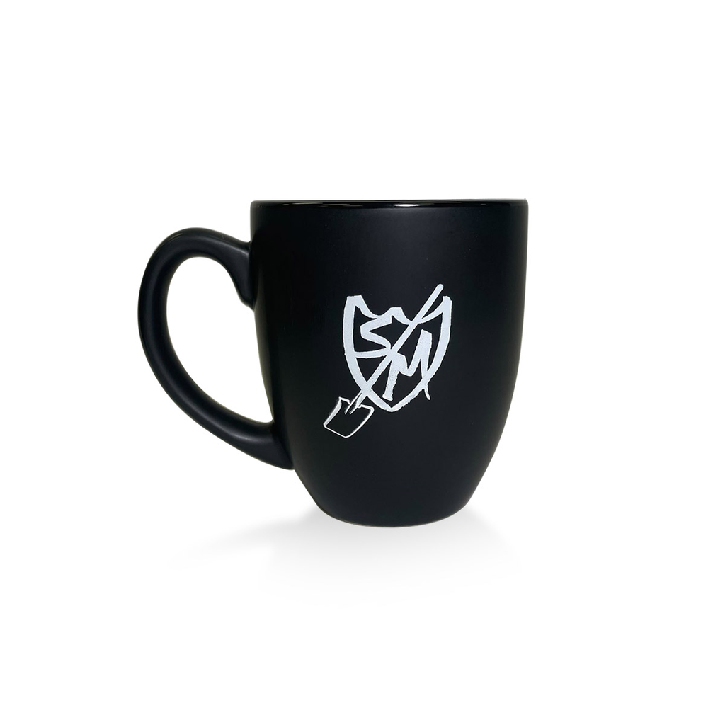 A S&M Bistro Coffee Mug with a white logo on it.