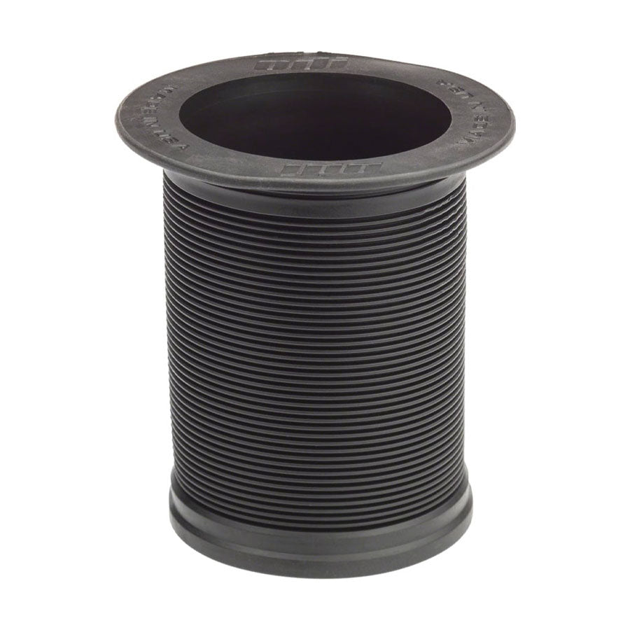 A black plastic spool with a rubber grip, the Odi Long Neck Stubby Cooler, on a white background.
