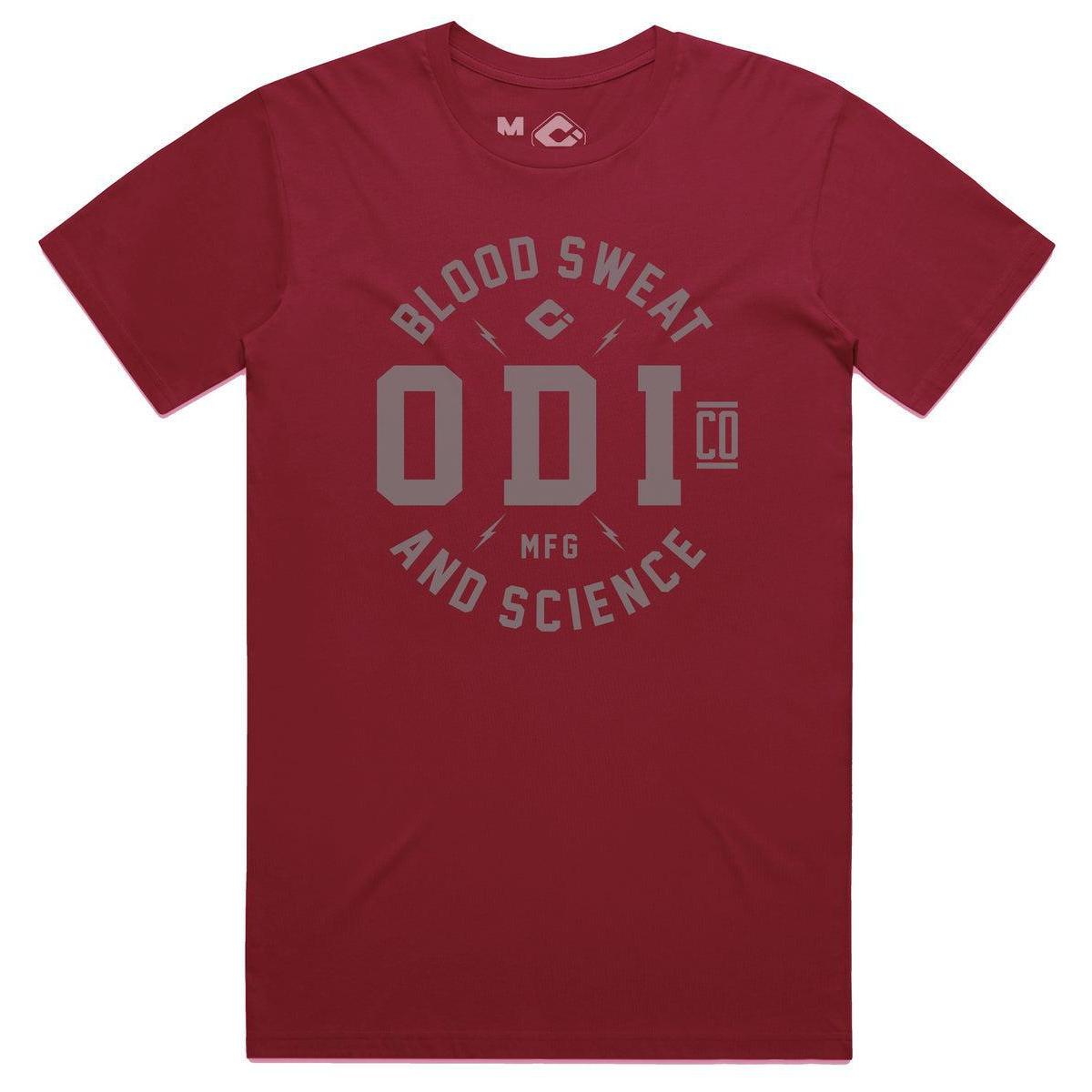 The ODI Token T-Shirt is a red, ring-spun cotton jersey with "Blood Sweat and Science ODI Co MFG" boldly printed on the front, ideal for riders who want to make a statement.