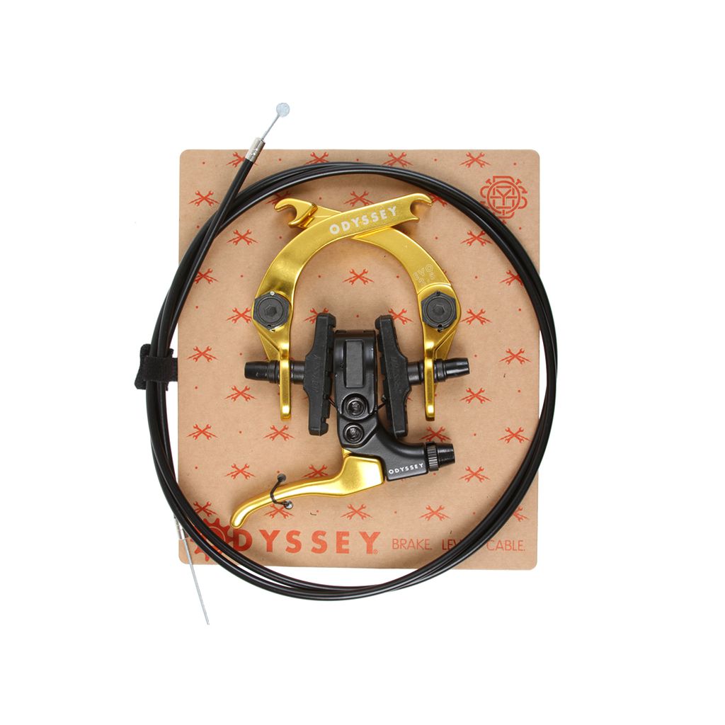 The Odyssey Evo 2.5 Brake Kit, showcasing a brake lever and cable set with gold-black components, is presented on branded cardboard packaging complete with modular hardware.
