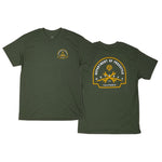 The Odyssey Service T-Shirt is green with a "Department of Freestyle" design on the back and a smaller emblem on the front. The design features the text "Odyssey California" with yellow graphics, giving it a distinct freestyle department uniform vibe.