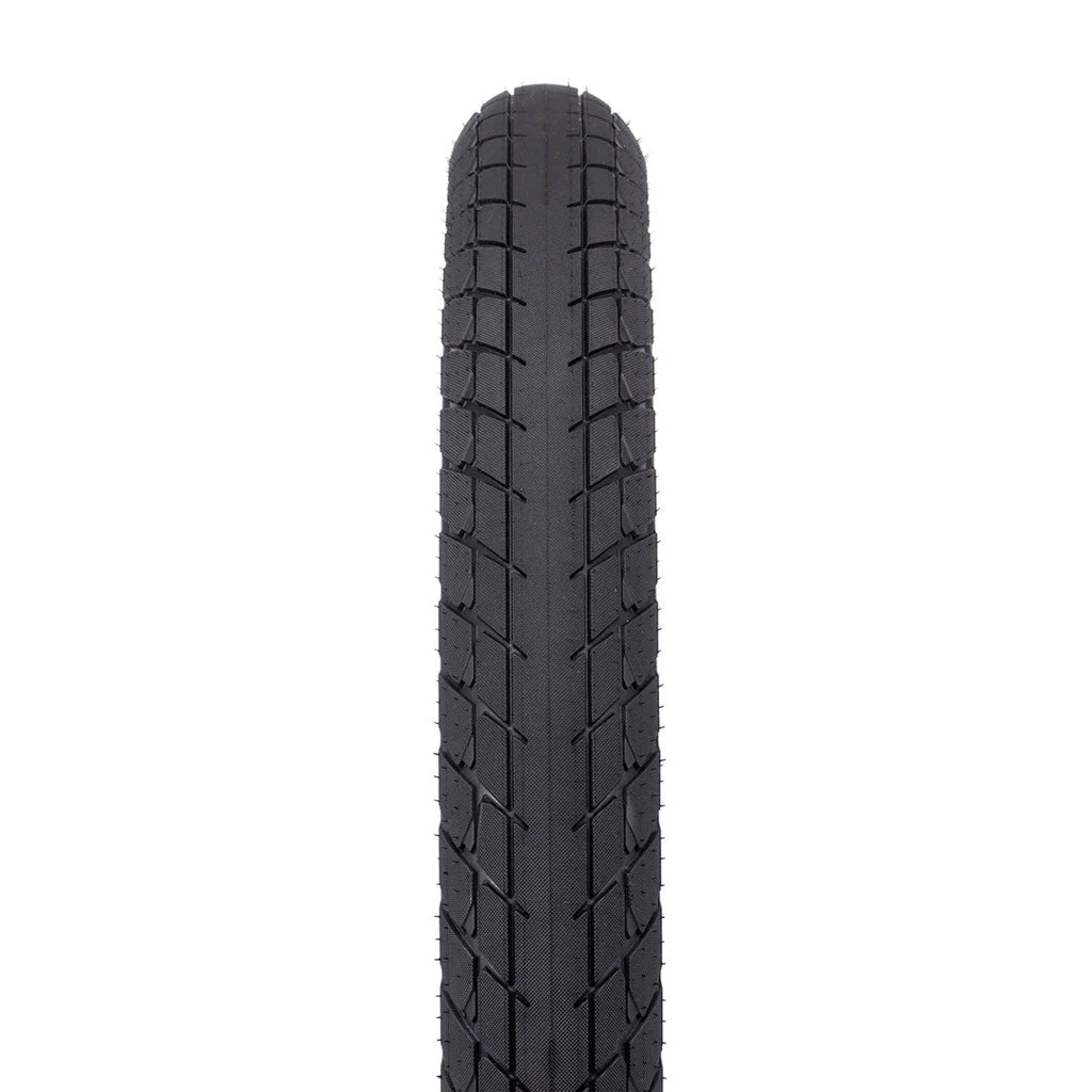 A close-up of the Eclat Optima Tyre in black, featuring an all-terrain tread pattern, is shown from above on a white background.