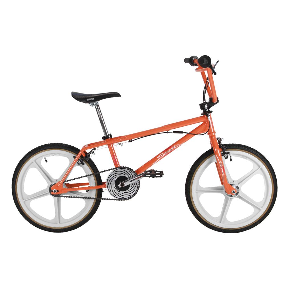 The Skyway Street Beat EX 20 Inch Bike features an orange 4130 chromoly frame, black seat, white mag wheels, and black handlebars, shown from the side against a white background.