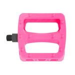 Odyssey Twisted PC Pro Pedals in bright pink feature a rectangular shape, visible grip studs, and a left-side black axle. Made from durable nylon composite, these BMX pedals are shown against a white background.