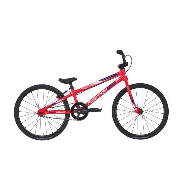 A red Position One Junior Bike (2024) with an all-aluminium frame and 100% CrMo forks on a white background.
