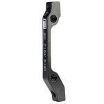 A Promax PM for IS Disc Brake Adaptor marked with "F:160 / R:140" and an arrow, compatible with a 140mm rotor. It features four mounting holes, designed for Post Mount disc brake calipers, and a logo at the top.