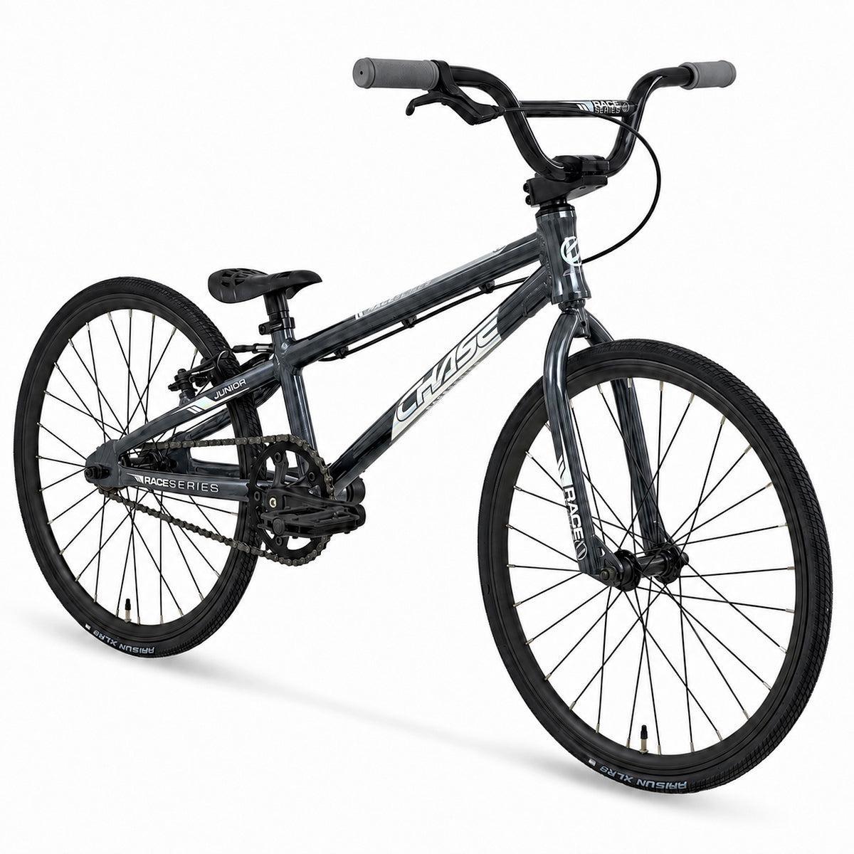 The Chase Race Series Junior Race Bike (2027), a black BMX-style bicycle featuring a padded seat, straight handlebars, and slim tires, is displayed on a white background.
