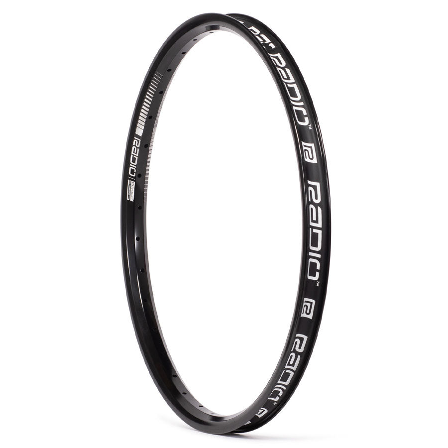 A black alloy rim with a white logo on it, the Radio Argon Pro Rim is a tubeless-ready rim.