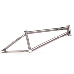 The Radio Nemesis Frame is a bare metal BMX frame with a minimalist design, welded joints, and "RBF" marked near the front.