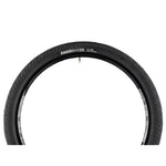 The Radio Stratus 26" tire features a durable build, sleek black finish, and strategically placed valve stem, making it perfect for all-terrain adventures.