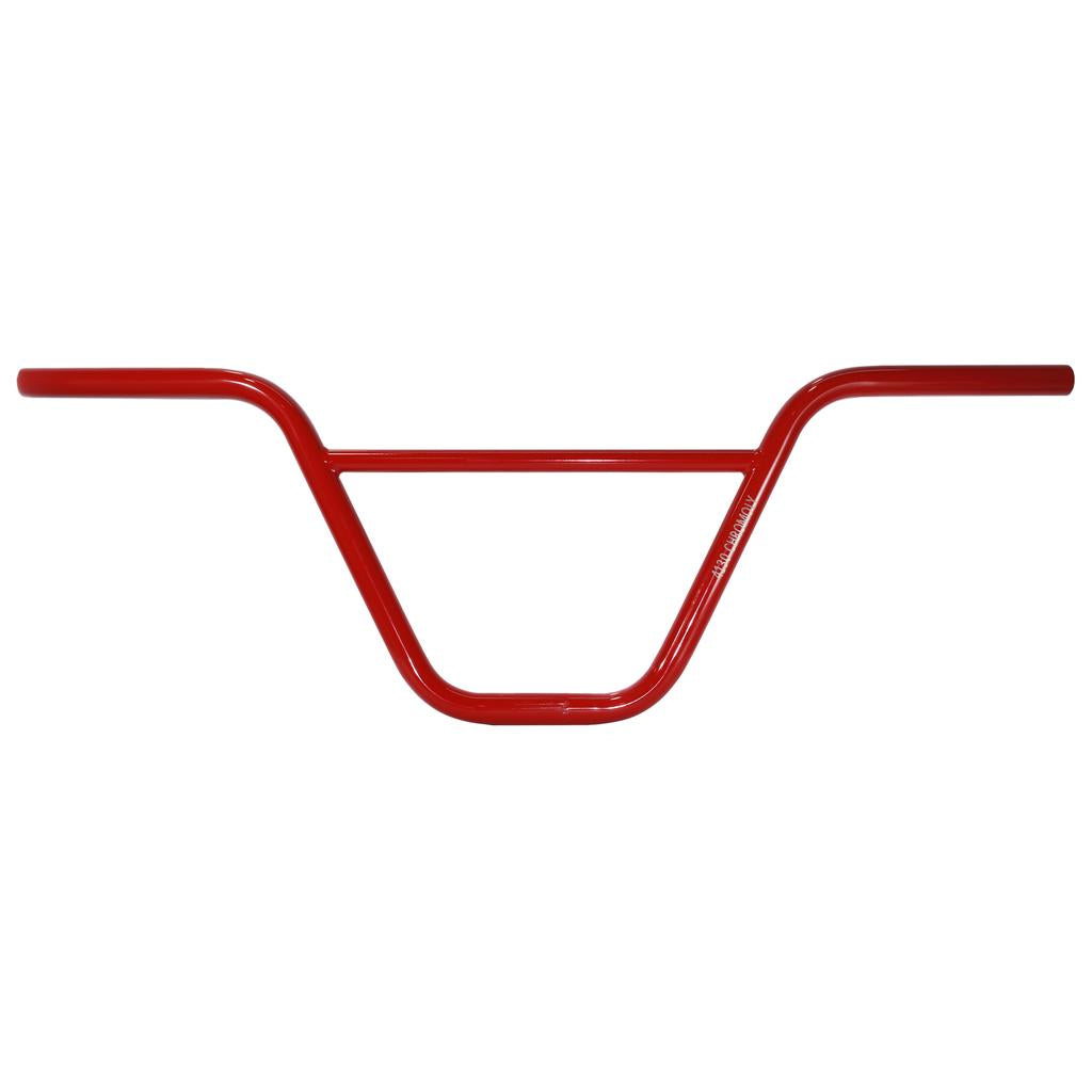 The DRS Retro Bars is a red bicycle handlebar featuring a wide, angular design with a central support bar. Its retro 80's style evokes nostalgia, combining classic aesthetics with modern functionality reminiscent of old school bikes.