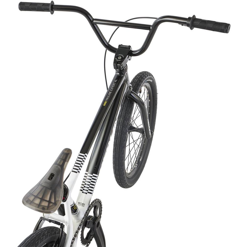 Redline Proline Expert XL bike viewed from the side, showcasing handlebars, frame, and front wheel.