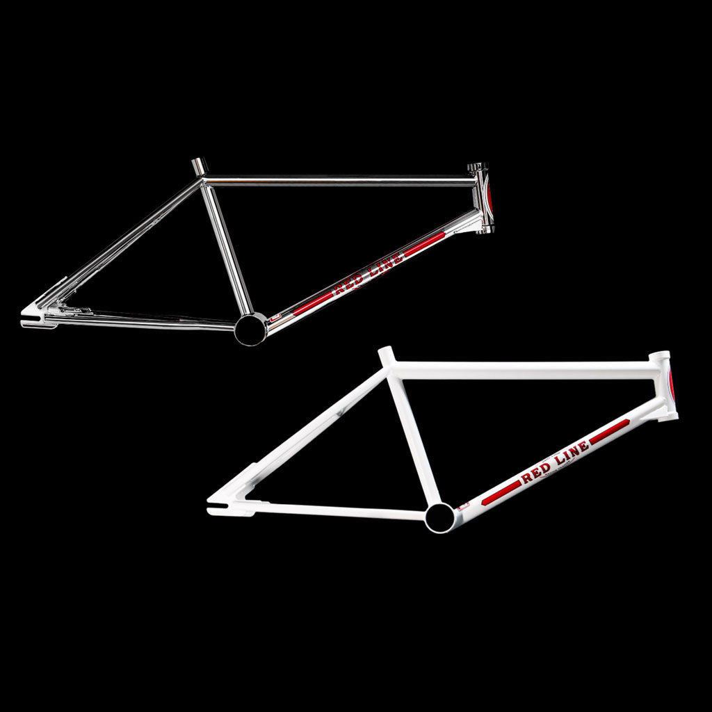 Two Redline Proline Frame/Fork/Handlebar Kits, one in silver and one in white, are positioned diagonally against a black background, both featuring "Redline" branding in red letters.