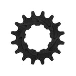 The black Rennen Alloy Cog, made from 7075-T6 Aluminium, has 12 rounded teeth with a single speed specific profile and a central hole, shown from above on a white background.