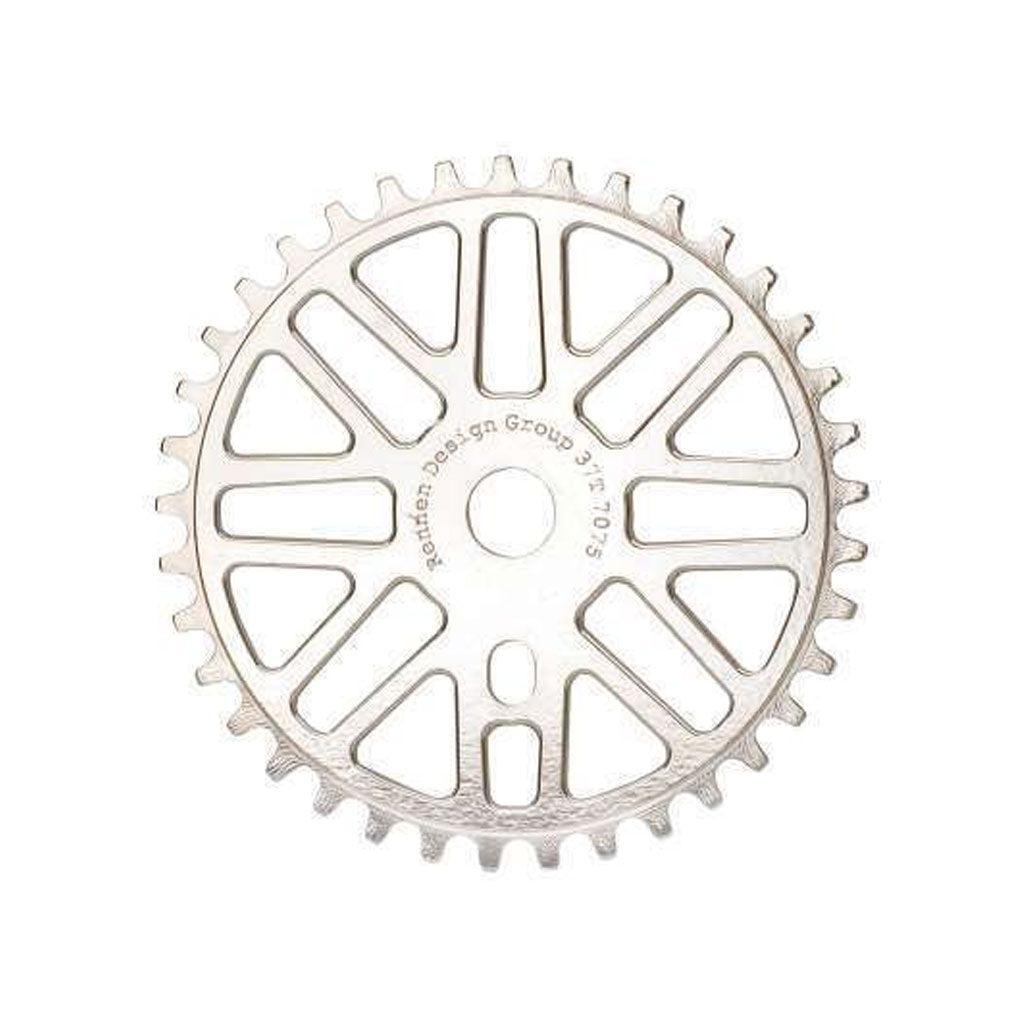 Circular metal gear with evenly spaced teeth and a series of cut-out patterns along the inner section. Crafted from 7075-T6 Aluminium, this Rennen Alloy Race Sprocket 44T (19mm) features text reading "Portland Design Group 31T/705".