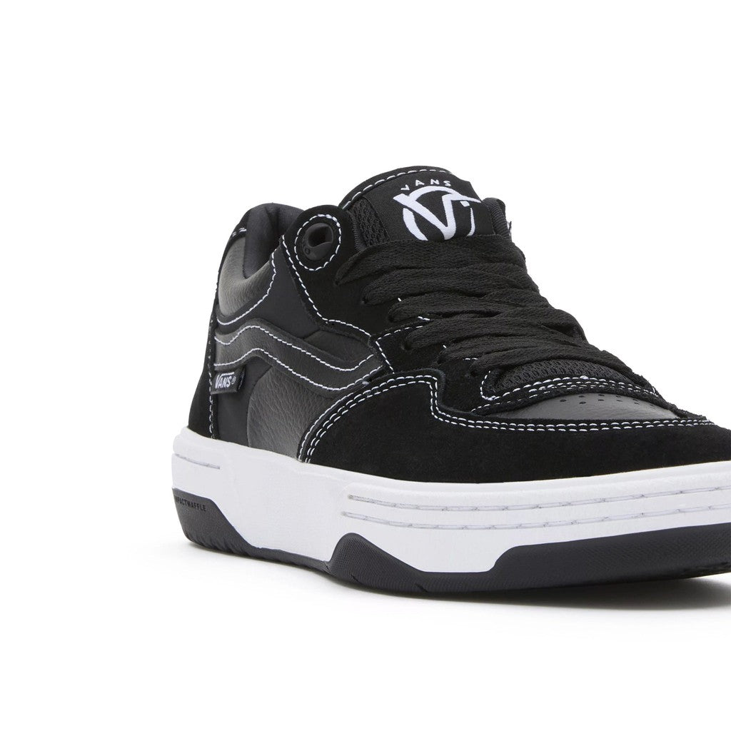 The Vans Rowan 2 skateboarding sneaker offers impact protection with its white soles.
