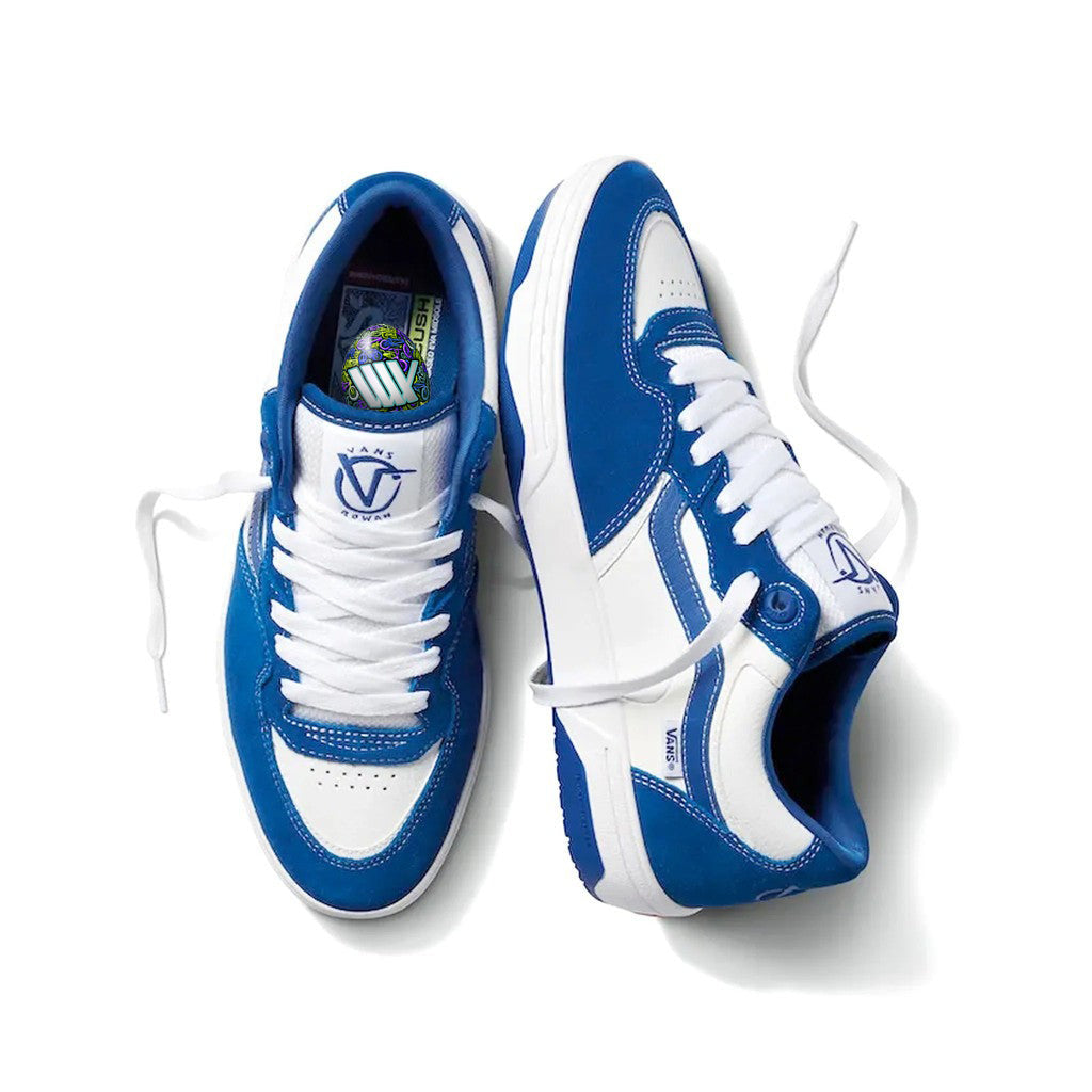 A pair of blue and white Vans Rowan 2 Shoes - True Blue/White sneakers with untied laces displayed on a white background.