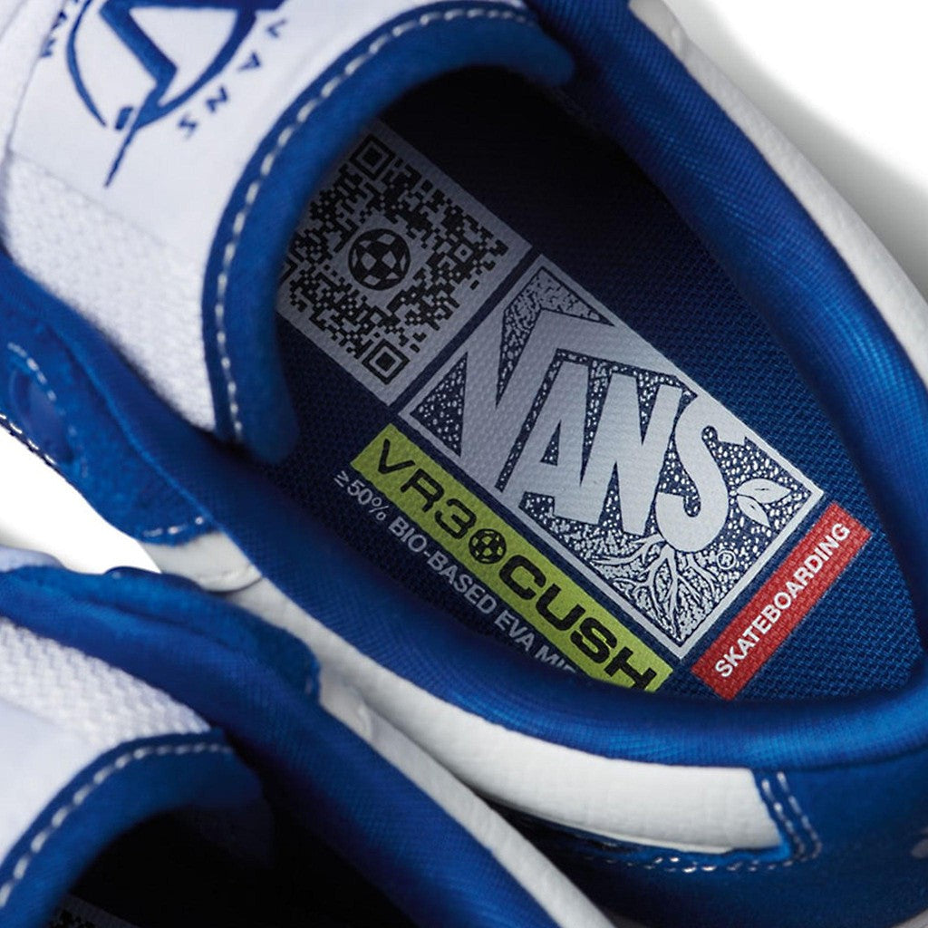 A pair of blue and white Vans Rowan 2 shoes - True Blue/White with a QR code on them.