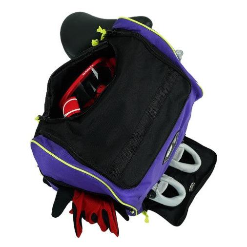 A purple and black S1 Helmet / Gear Backpack with an open top compartment reveals red gloves and a red item inside, plus two white handles in a lower pocket.