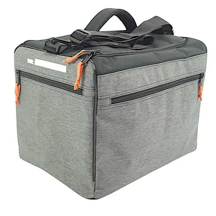 The S1 Helmet / Gear Bag V2 is a grey and black soft-sided insulated cooler with a zippered front pocket, carry handles, and orange zipper pulls—ideal for keeping your race kit chilled at the track.