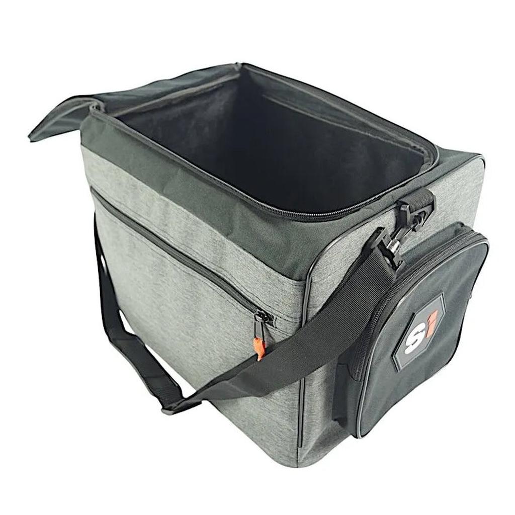 The S1 Helmet / Gear Bag V2 is a grey soft-sided cooler bag with a black zipper, adjustable shoulder strap, front zip pocket, and open main compartment—ideal for carrying lunch or race kit essentials.