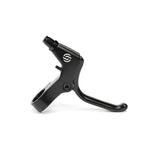 Salt Kids V2 U-Brake Lever with a hinged clamp and an adjustment screw, lying on a white background. The child-specific lever is designed for easy installation and adjustment, featuring short reach for young riders.