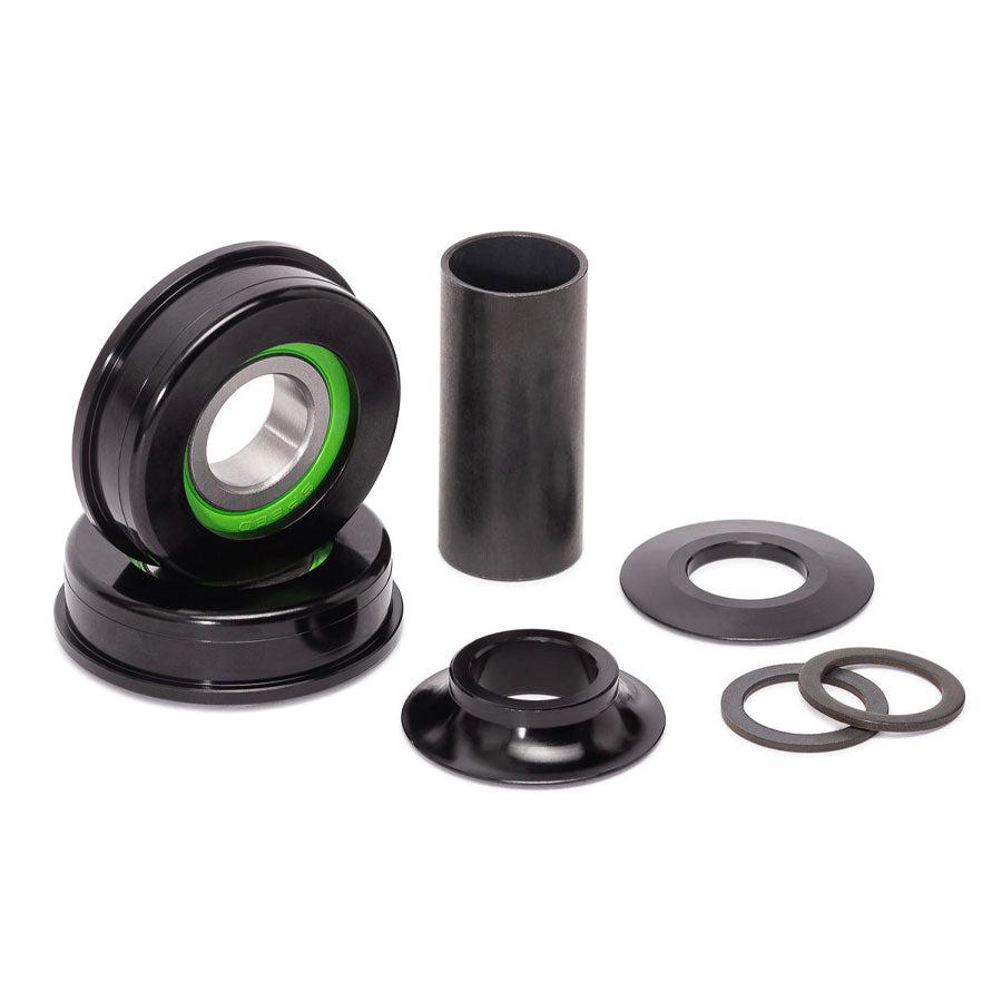 Salt Plus Echo Sealed US Bottom Bracket Set featuring a black and green design, crafted with alloy CNC components, sealed bearings, spacers, and a steel sleeve.