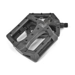 A pair of Salt Plus Stealth Nylon Pedals with loose ball bearings on a white background.