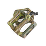 A pair of Salt Plus Stealth Nylon Pedals featuring loose ball bearings, set against a white background.