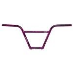 A purple bike handlebar with a pink pattern featuring Salt Pro 4 Piece Bars.