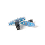 Two Salt Propeller Brake Pads, blue and black with a soft rubber compound for black and coloured rims, are displayed on a white background, one pad resting atop the other.