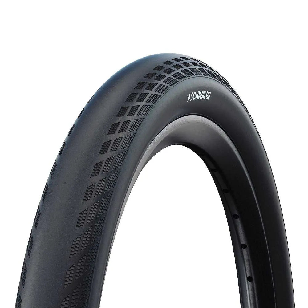 A close-up of the Schwalbe SX-R BMX Tyre showcases its smooth tread and visible branding, emphasizing its reputation as a lightweight race tyre.