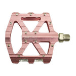 The SD CNC V2 Junior/Expert Pedals feature a pink CNC alloy body, silver axle, multiple traction pins, and precision sealed bearings—delivering durable, smooth performance for junior racers.