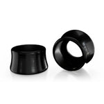 Two black, flared silicone ear tunnels are displayed on a white background—one upright, the other on its side—featuring a sleek design reminiscent of SD-X Sniper Evo 10mm Bolt Caps.