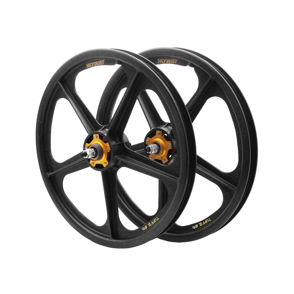 Two black five-spoke Skyway TUFF II 60th Anniversary 20 Inch wheels with orange hubs, made of durable Zytel Nylon, are positioned side by side against a white background.